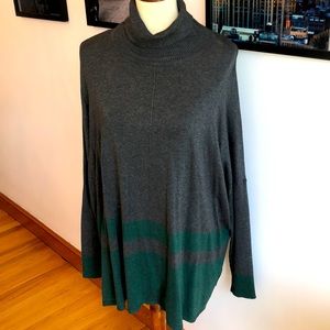 Cape like styled sweater